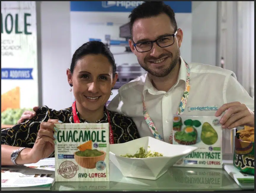Figure 5. Catalina Oñate (Founder and CEO of Smart Food Solutions) and David Flores (Commercial Technician - Area Manager of Hiperbaric) presenting the new Avo-Lovers line in Gulfood 2019 Smartfood HPP Hiperbaric